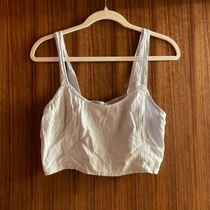 blue tank top, cropped